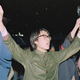 University students hold hands as they sing the Chinese National Anthem during a protest.
